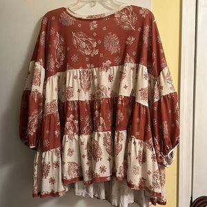 Cute top with rust orange and cream colored
